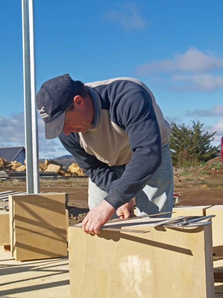 Stonemason Robert Whitney marking stone for dressing (Image: Brian Andrews)