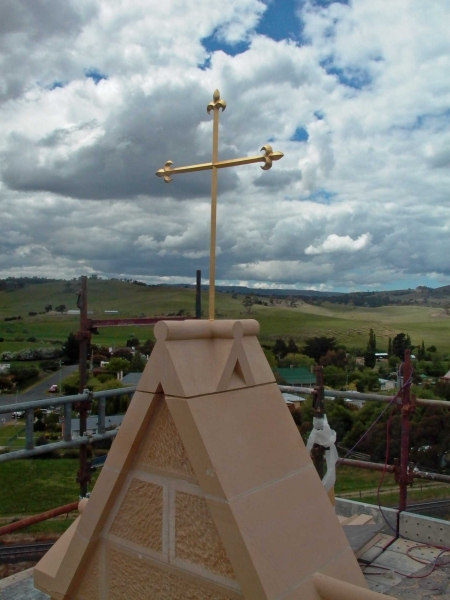 Triple-gilt cross on bellcote gable (Image: Brian Andrews)