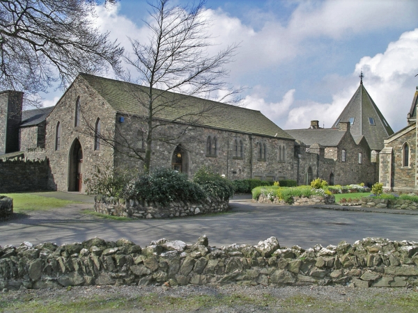 Former farm buildings with chapter house roof at right (Image: Nicholas Callinan)