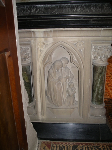 Ann and John Hardman Powell on the corner of the Pugin tomb (Image: Nicholas Callinan)