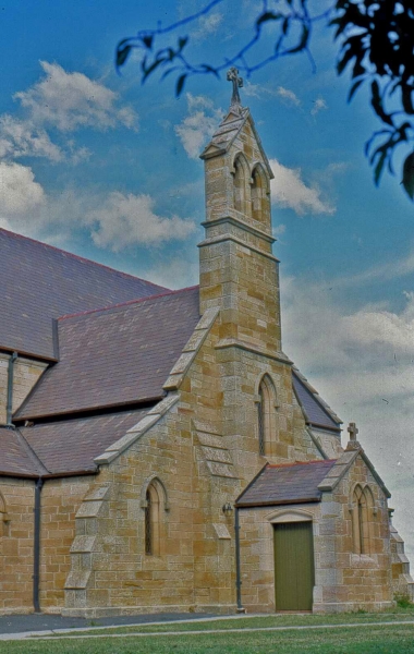 Remnant of original church with later porch, against 1934 enlargement (Image: Brian Andrews)